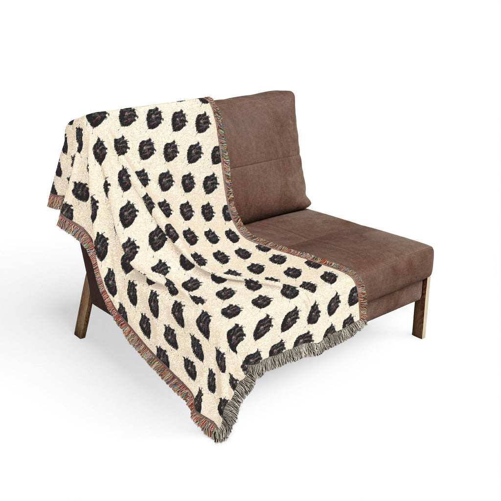 Stay cozy bundled up in a Woven  "Little Dark Heart" Throw Blanket — Reversible Boho Plaid Pattern