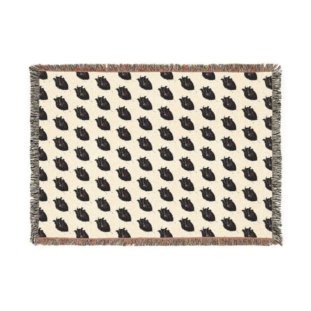 Stay cozy bundled up in a Woven  "Little Dark Heart" Throw Blanket — Reversible Boho Plaid Pattern