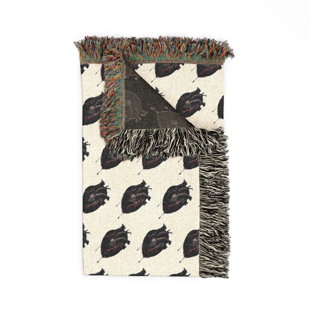Stay cozy bundled up in a Woven  "Little Dark Heart" Throw Blanket — Reversible Boho Plaid Pattern